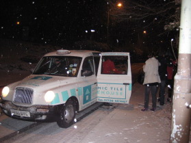 Taxi struggling with the snow