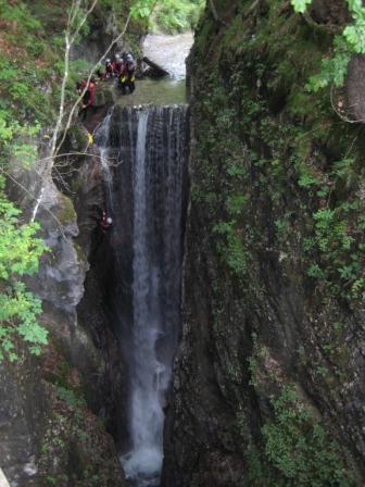 Abseiling down the waterfall